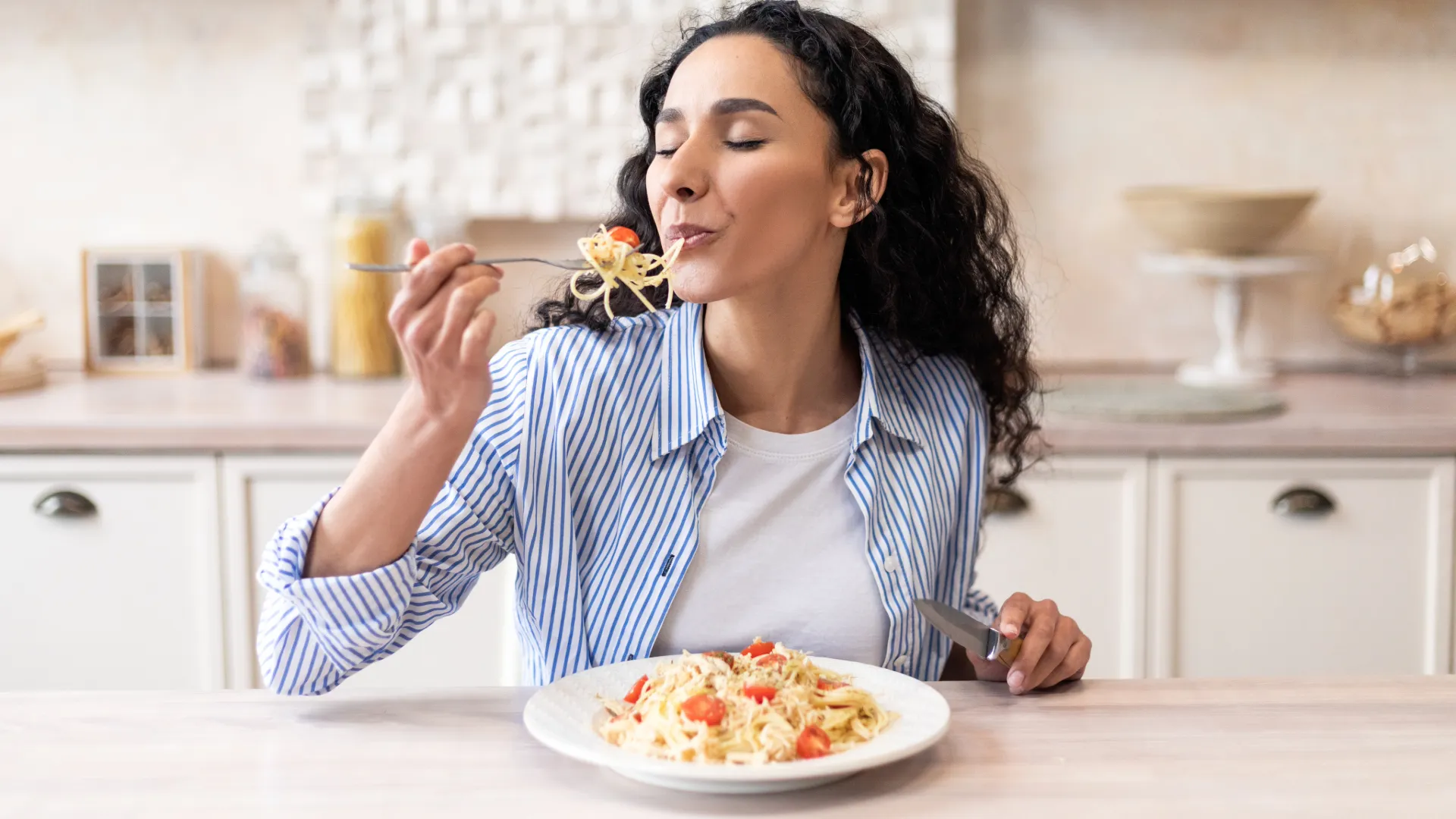 Woman Eating White Truffle Lobster Pasta 